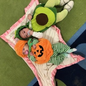 Kids in Costumes Laying Down